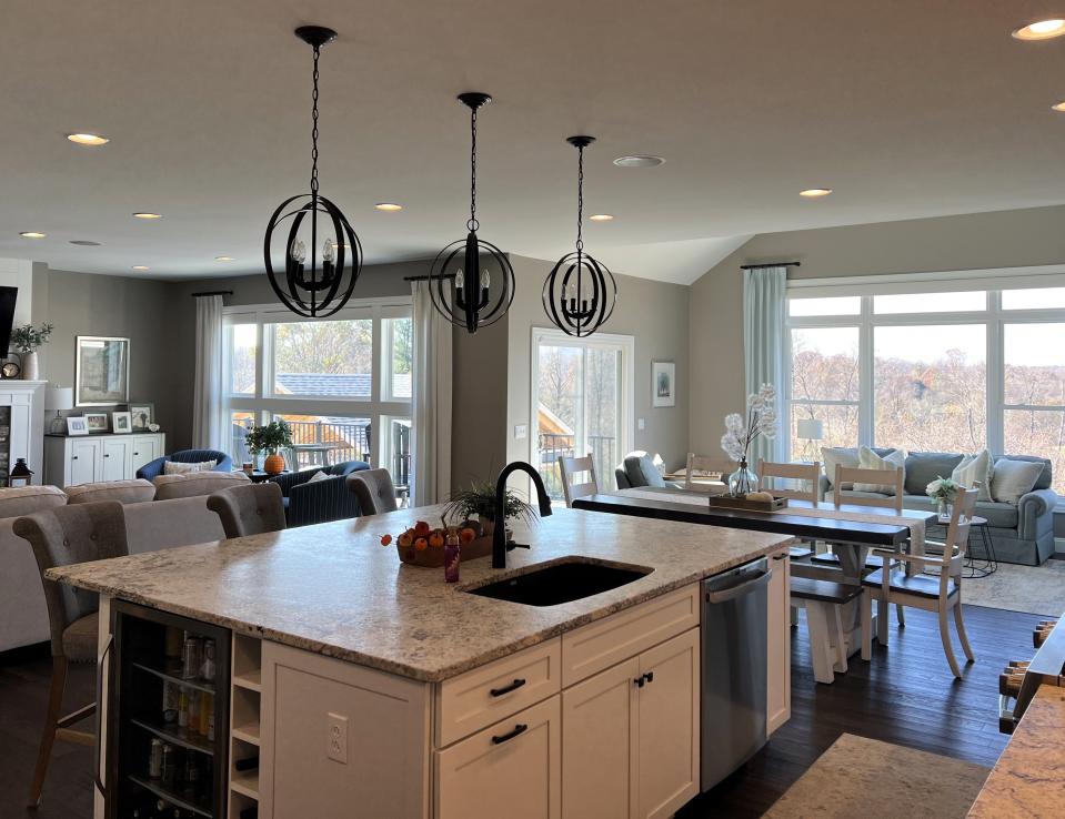 A kitchen and dining area of a recently constructed home by Sutton Construction. John Sutton said kitchens and bathrooms are tops among rooms for remodeling and when it comes to new builds, people like open floor plans.